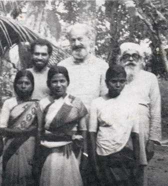 Tom Sutherland (back centre), Father Gabriel and helpers at Trippaadam, India.